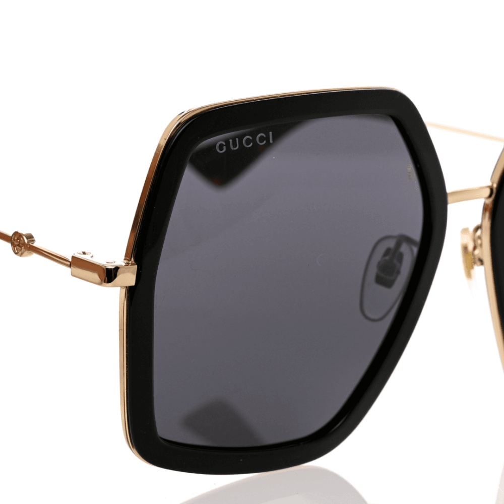 lunette de soleil Gucci 0106S modèle oversize avec logo GG doré