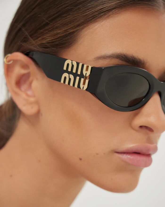 Lunettes de soleil Miu Miu MU 11WS femme