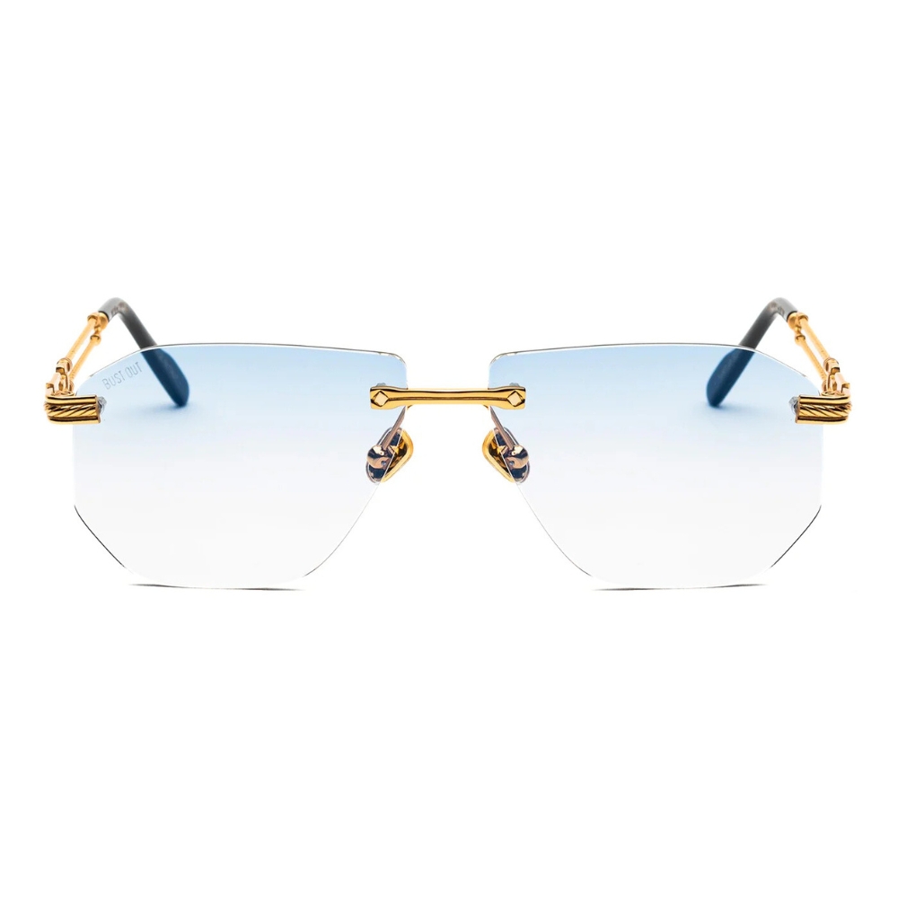Lunettes de soleil Bustout Golden Branches, modèle design avec monture percée et branches dorées