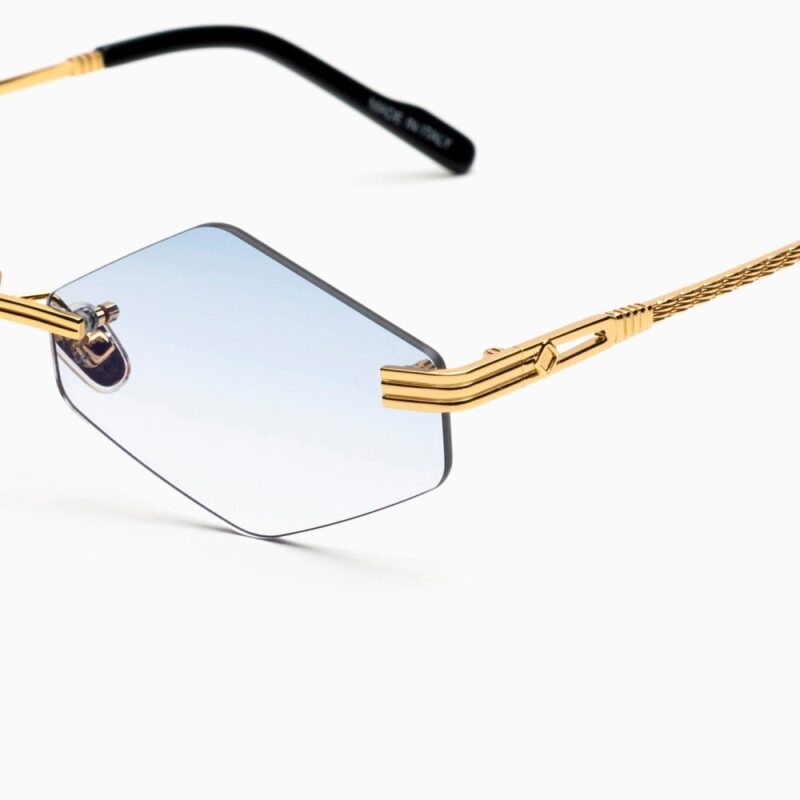 Lunettes de soleil BustOut KAYT ROMBO cadre doré verres bleu dégradé Lunettes de soleil BustOut KAYT ROMBO - Modèle femme cadre doré avec verres bleu dégradé