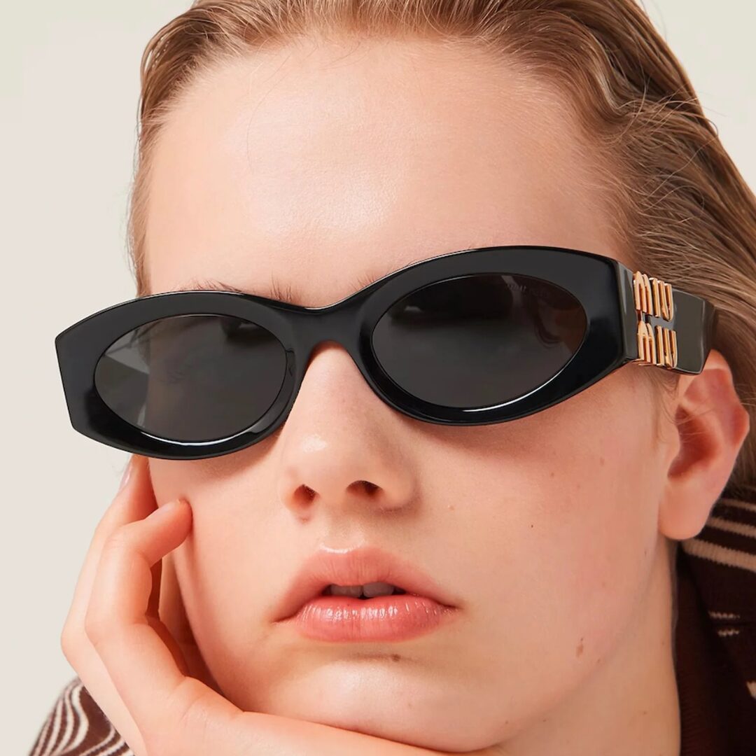 Lunettes de Soleil MIU MIU modèle SMU 11W pour femme, monture noire ronde