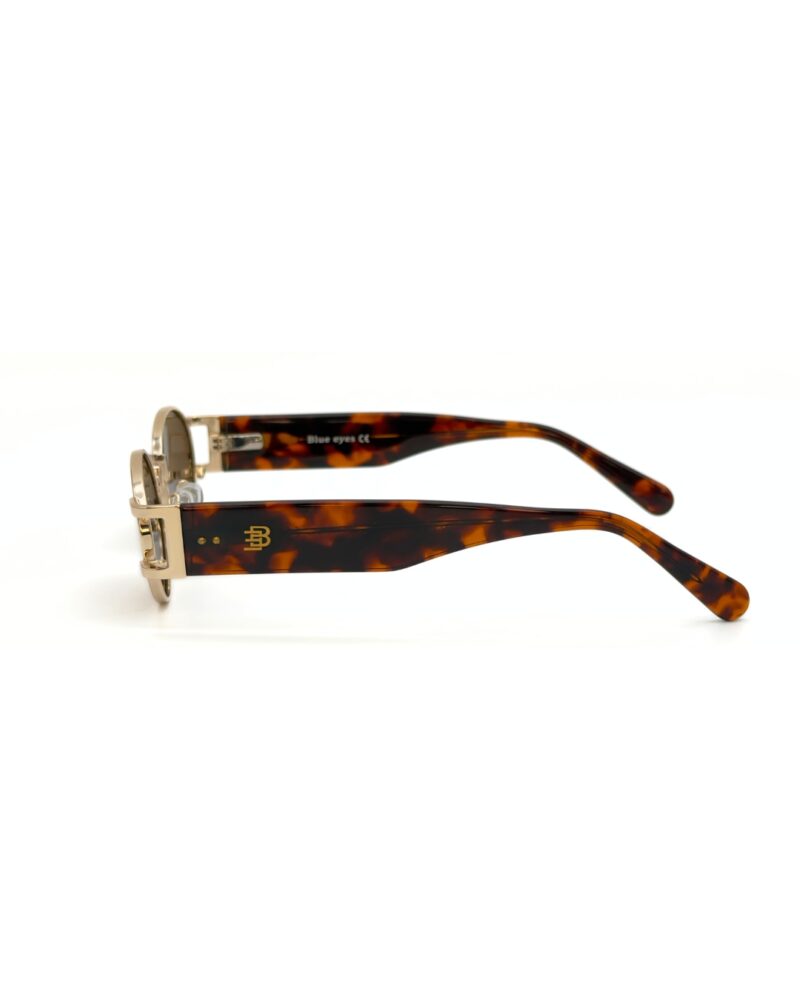 Lunettes de soleil Blue Eyes modèle AK17219, monture ovale vintage en métal et acétate pour femme et homme.
