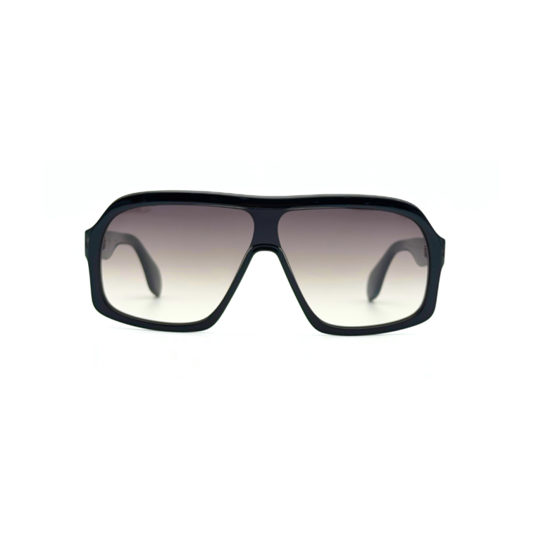 GIGI STUDIOS NAELLE GS1067/11 Noir Brillant - Vue Face et Profil Lunettes de soleil oversized GIGI STUDIOS NAELLE GS1067/11 en acétate noir brillant avec verres dégradés gris antireflets.