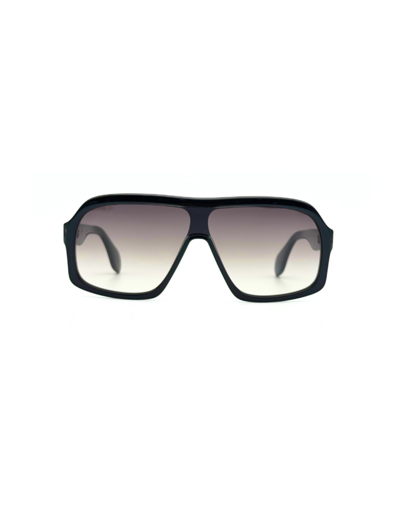 Lunettes de soleil oversized GIGI STUDIOS NAELLE GS1067/11 en acétate noir brillant avec verres dégradés gris antireflets.