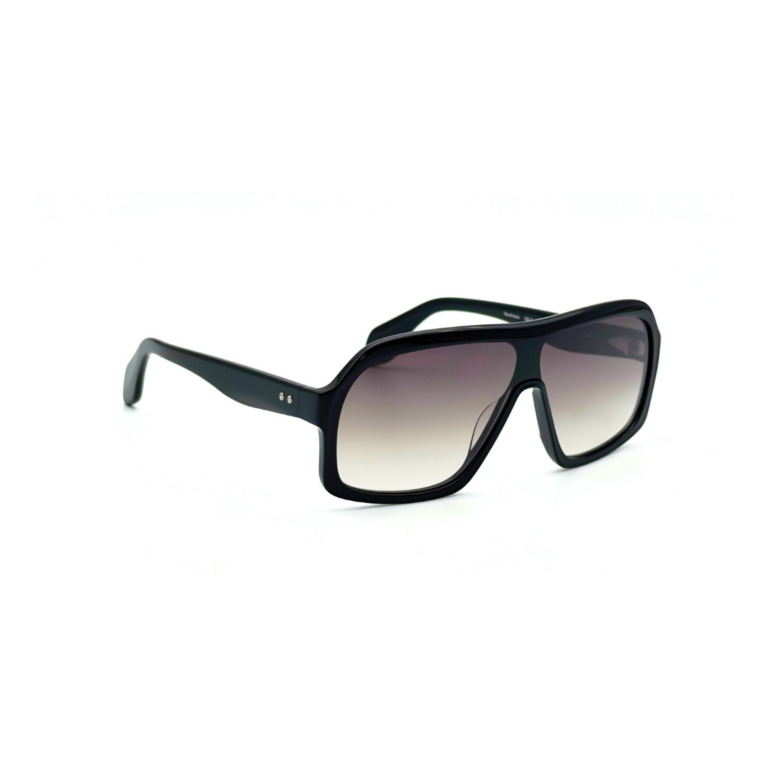 GIGI STUDIOS NAELLE GS1067/11 Noir Brillant - 3-4 Lunettes de soleil oversized GIGI STUDIOS NAELLE GS1067/11 en acétate noir brillant avec verres dégradés gris antireflets.