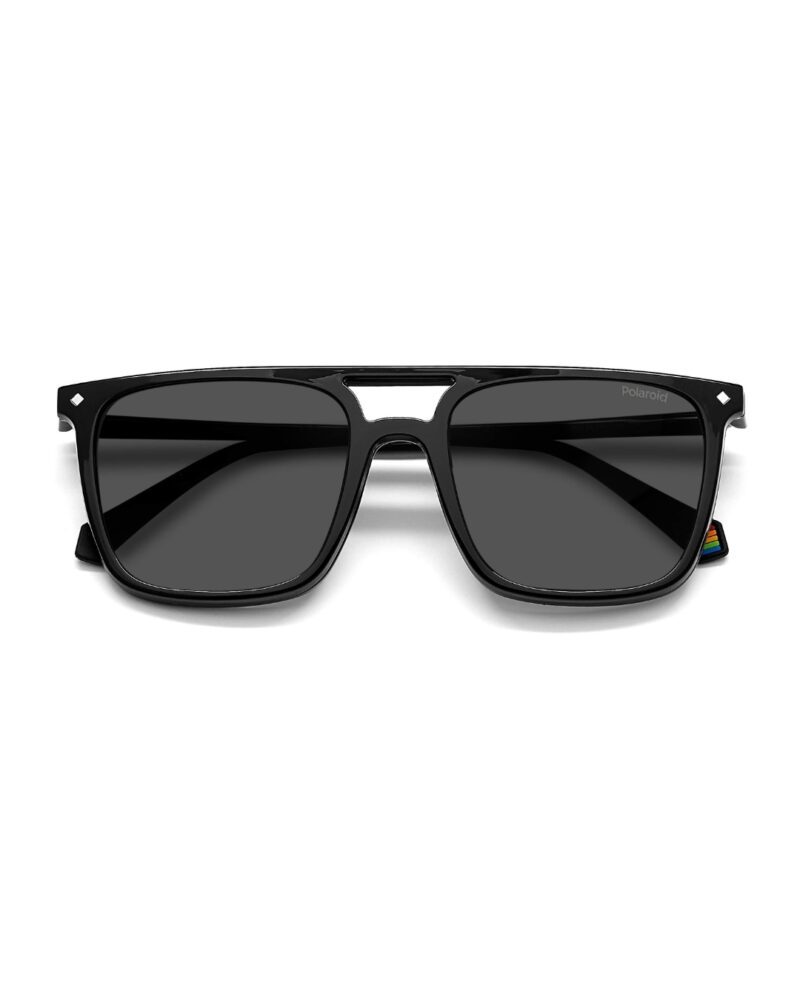Lunettes optiques carrées noires Polaroid PLD6166CS avec leur clip-on solaire polarisé magnétique détaché au premier plan.