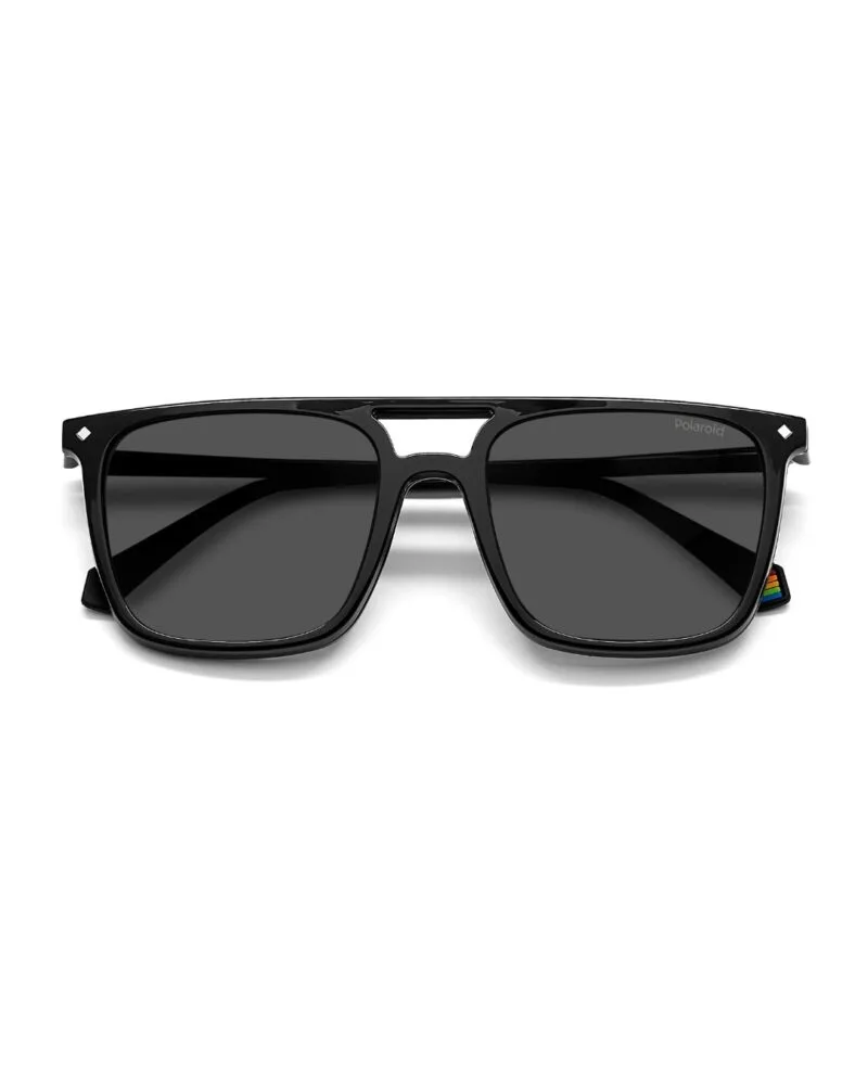 Lunettes optiques carrées noires Polaroid PLD6166CS avec leur clip-on solaire polarisé magnétique détaché au premier plan.