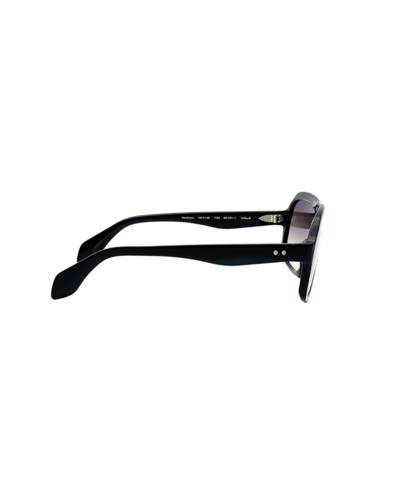 Lunettes de soleil oversized GIGI STUDIOS NAELLE GS1067/11 en acétate noir brillant avec verres dégradés gris antireflets.