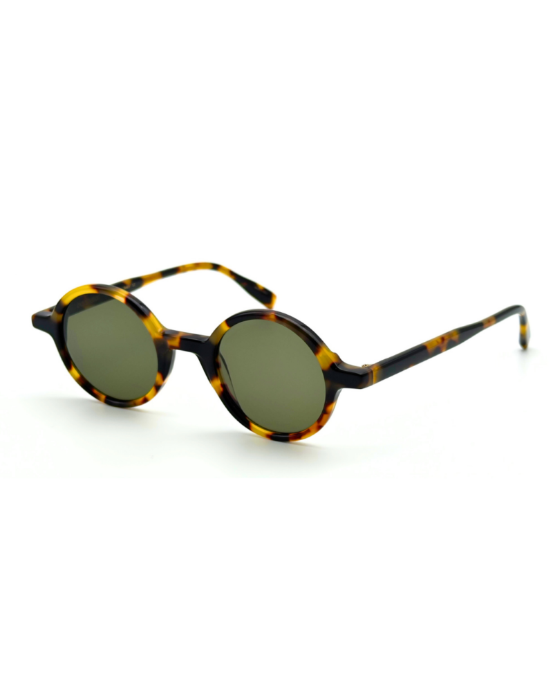 Lunettes de soleil de créateur rondes écaille de tortue Gigi Studios Greta verres vert foncé.