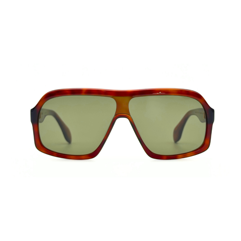 GIGI STUDIOS NAELLE GS1067/11 Écaille Havana - face Monture solaire de luxe GIGI STUDIOS NAELLE GS1067/11 en acétate marron écaille havana et verres dégradés verts.