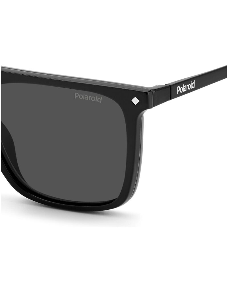 Lunettes optiques carrées noires Polaroid PLD6166CS avec leur clip-on solaire polarisé magnétique détaché au premier plan.