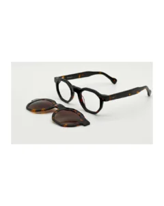 Kit lunettes de vue clip on Blue Eyes BE5010 Noir et Écaille présenté avec son clip solaire détachable posé à côté.