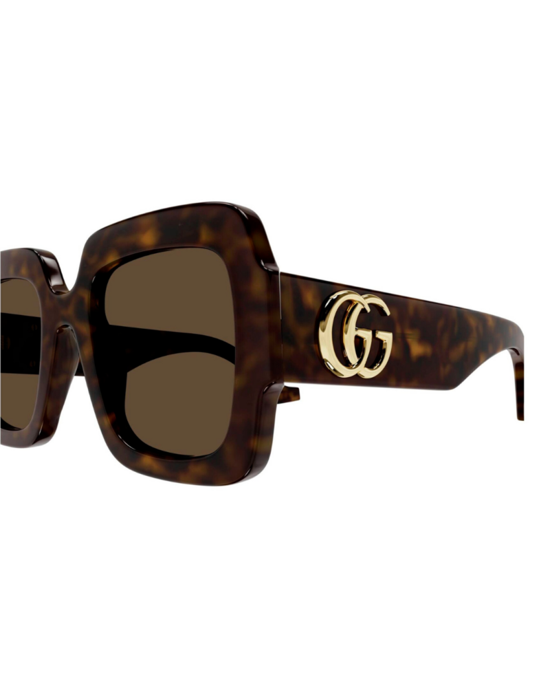Zoom détail logo GG doré sur branche écaille lunettes de soleil Gucci GG1547S 002